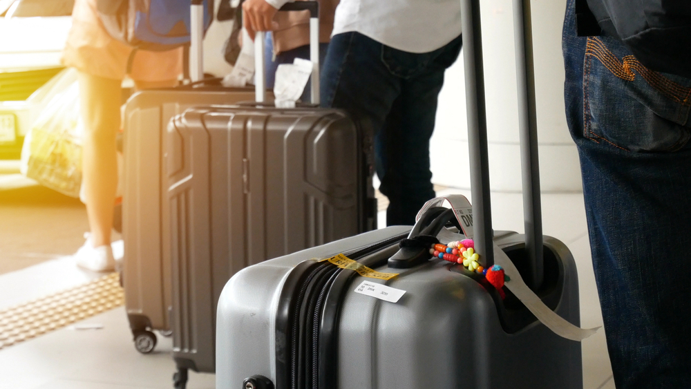 airlines with free checked baggage