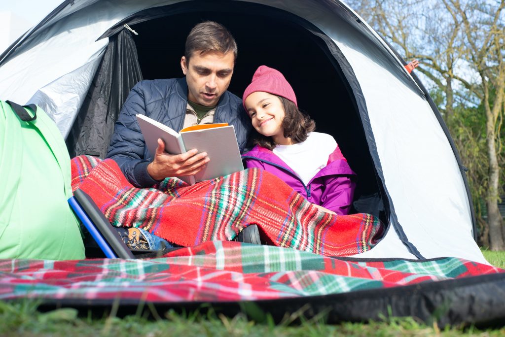 Dad and daughter camping